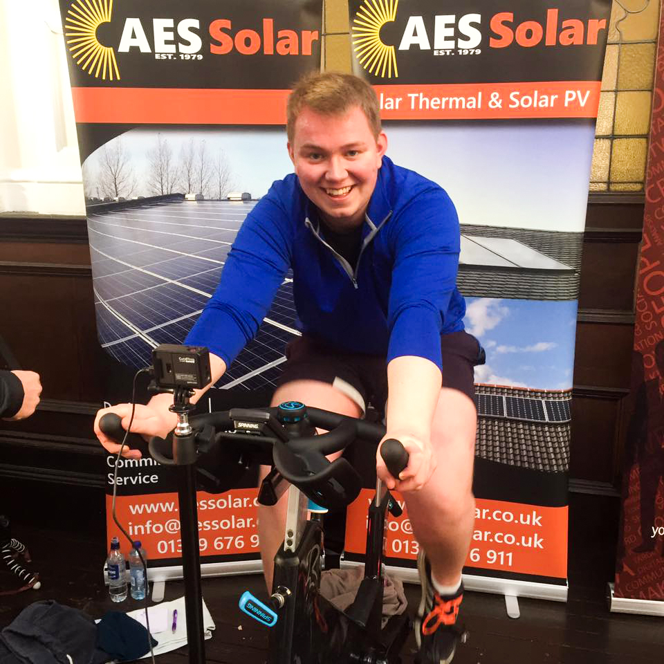 AES Solar Graduate Apprenticeship Cameron Duncan on a static bike 