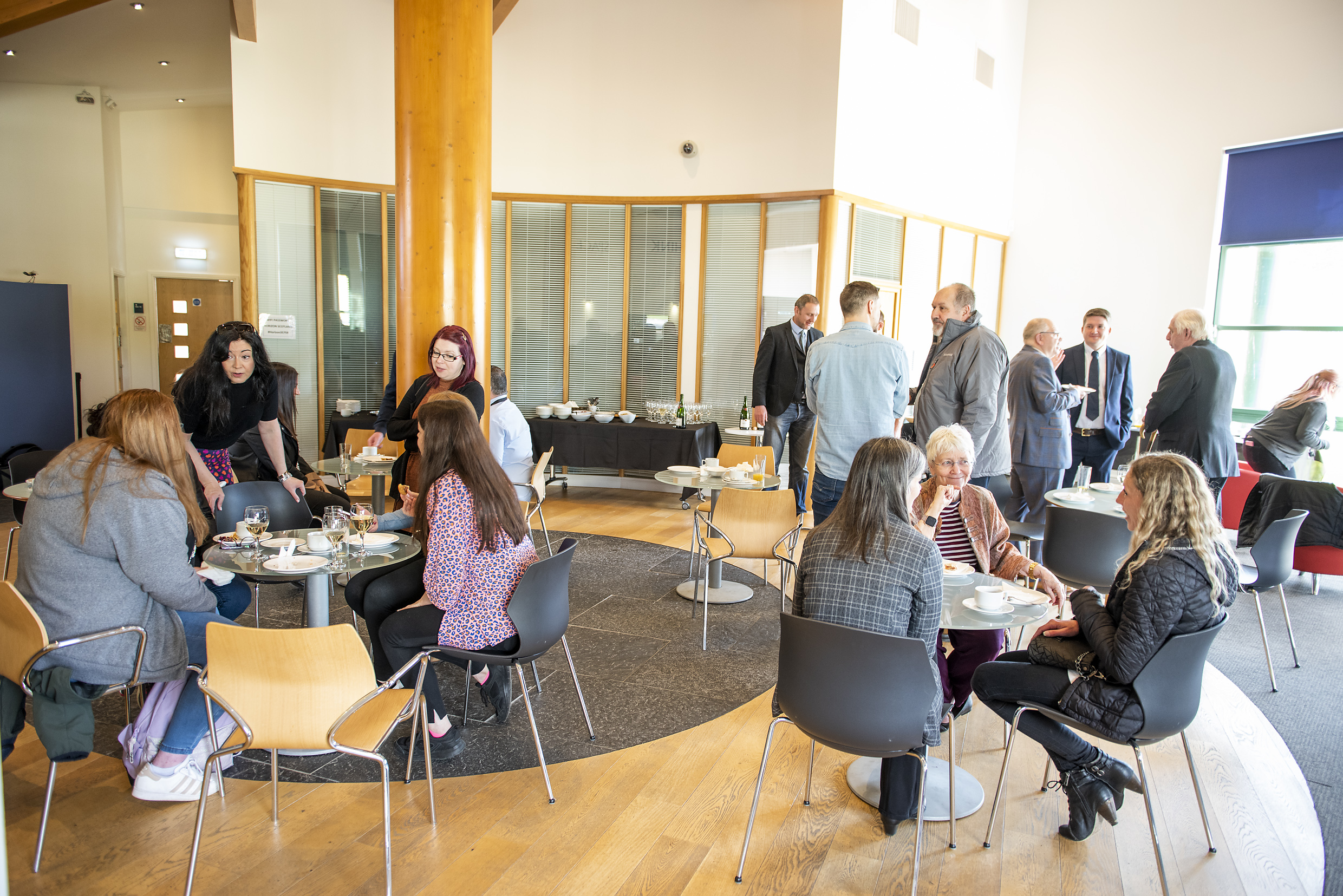 The AES Solar team gather to celebrate queen's award win