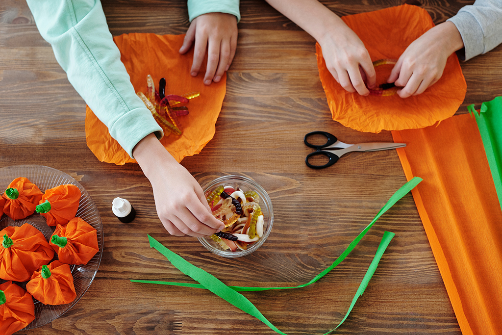 children making homemade sweet wrappers.
