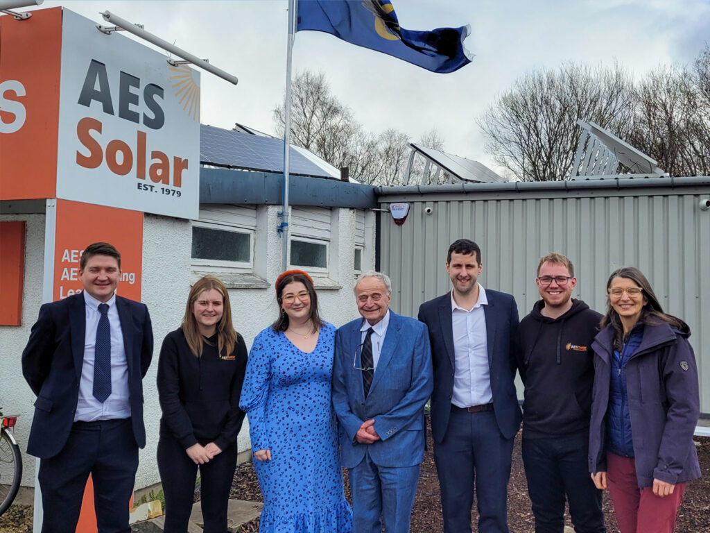 AES Solar Welcomes MSP at their head office in Forres with Queen's Award flag flying.